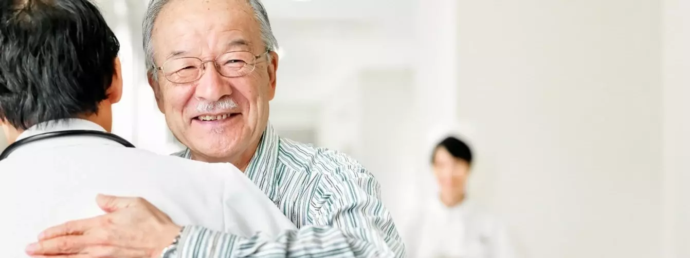 doctor hugging patient